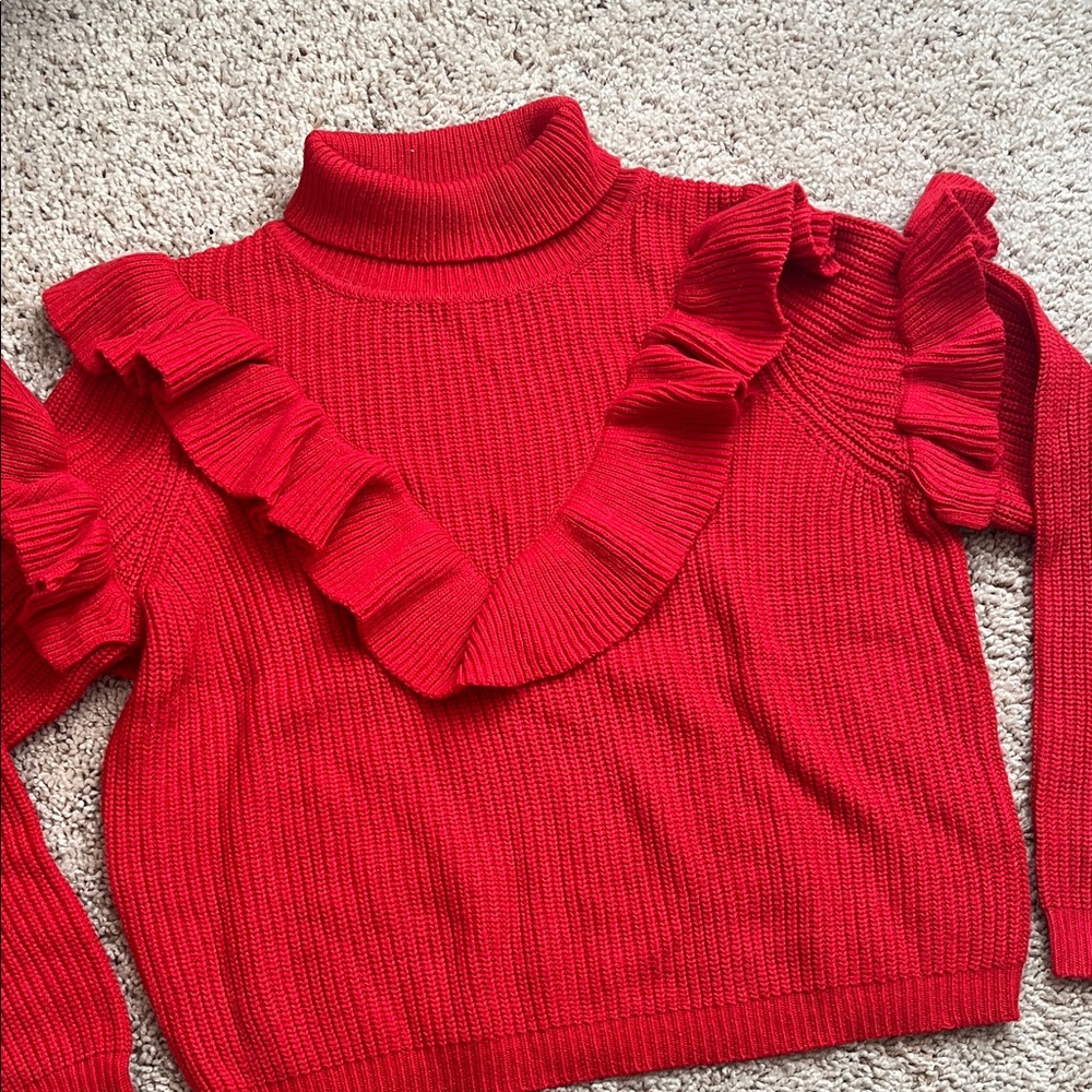 Red knit ruffle turtleneck sweater